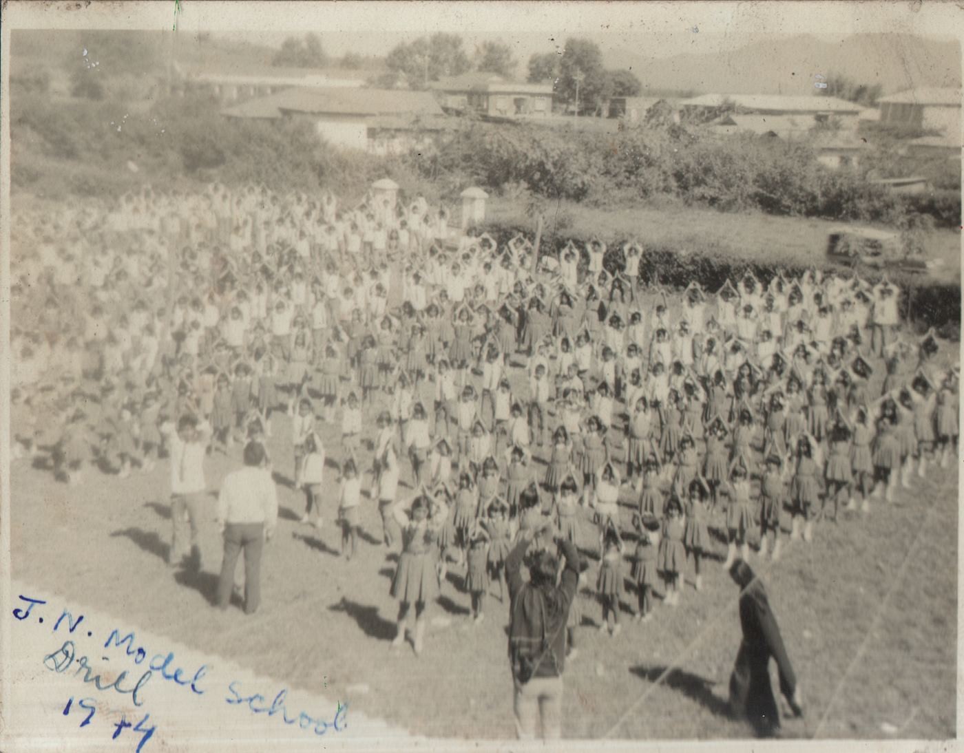 An assembly of Jawaharlal Nehru Model School students in 1974.